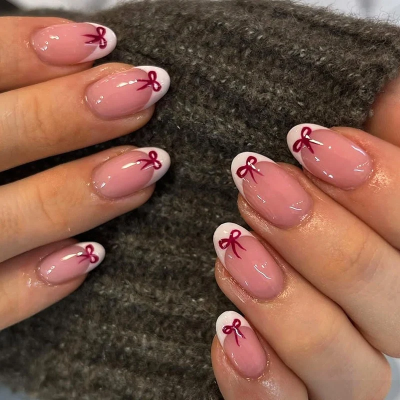 Elegante Kunstnagel-Set mit zarten Schleifenakzenten Brehn
