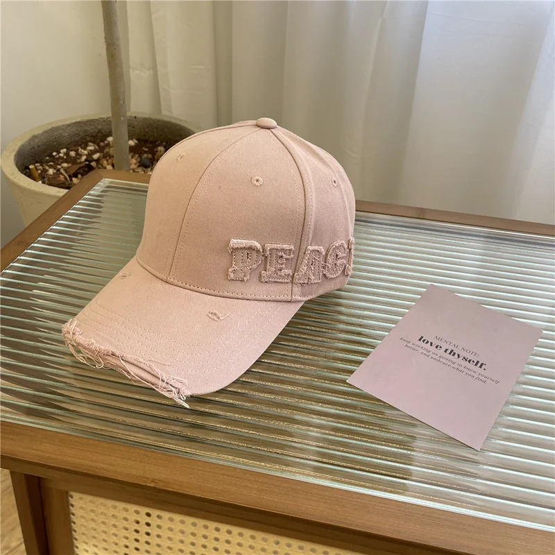 Damen Baseball Cap mit Peace-Grafik im Used-Look Skanto