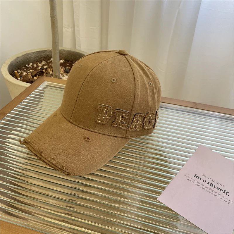 Damen Baseball Cap mit Peace-Grafik im Used-Look Skanto