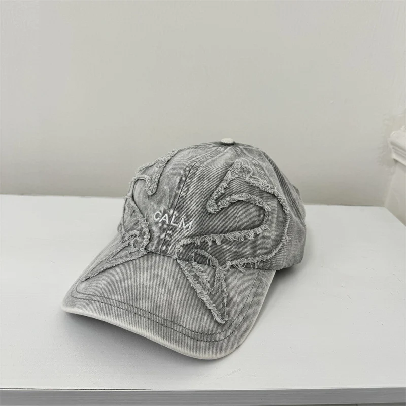 Damen Baseball Cap mit Grafik im Used-Look Skanto