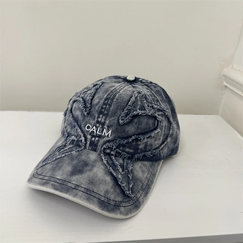 Damen Baseball Cap mit Grafik im Used-Look Skanto