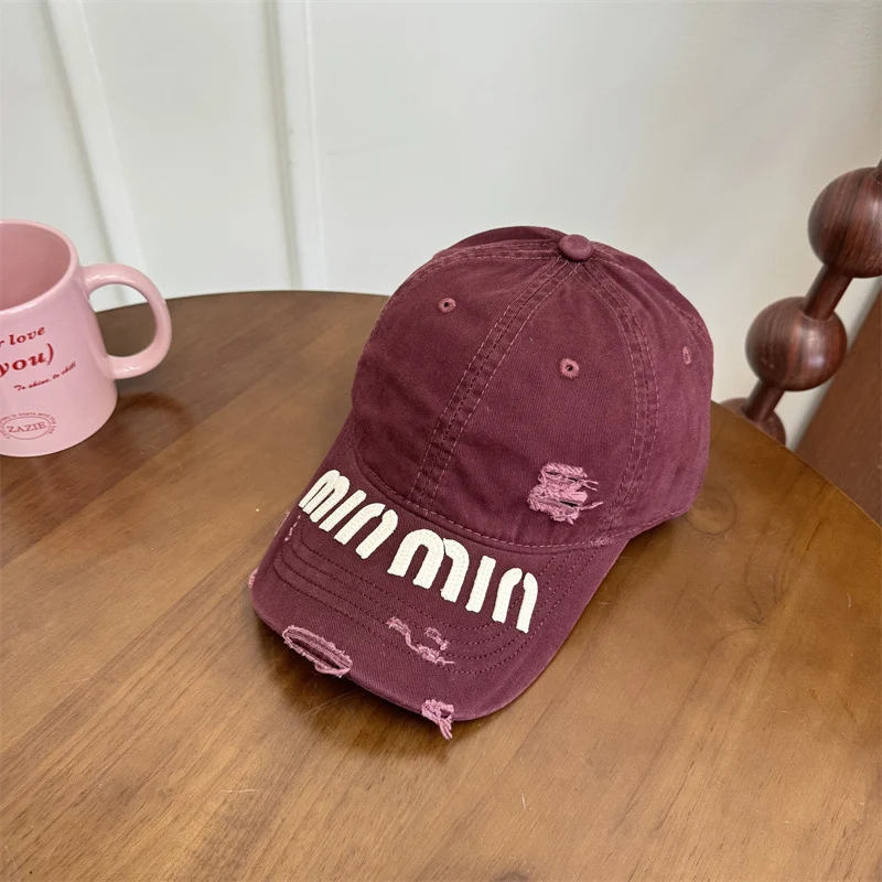 Damen Baseball Cap mit Grafik im Used-Look Skanto