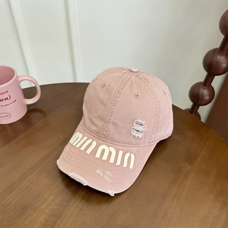 Damen Baseball Cap mit Grafik im Used-Look Skanto