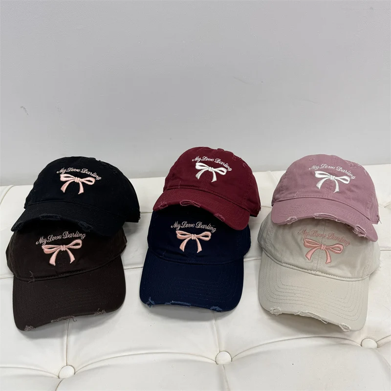 Damen Baseball Cap aus gewaschener Baumwolle mit Schleifenstickerei Skanto