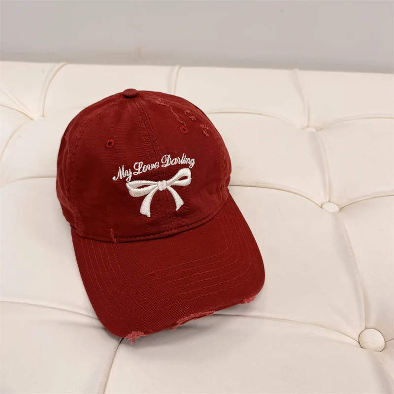 Damen Baseball Cap aus gewaschener Baumwolle mit Schleifenstickerei Skanto
