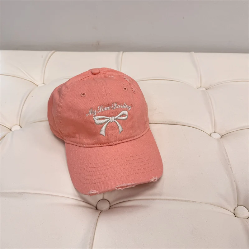 Damen Baseball Cap aus gewaschener Baumwolle mit Schleifenstickerei Skanto