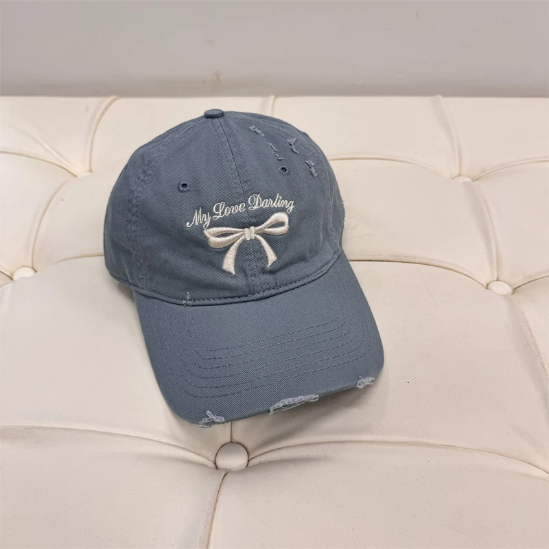 Damen Baseball Cap aus gewaschener Baumwolle mit Schleifenstickerei Skanto