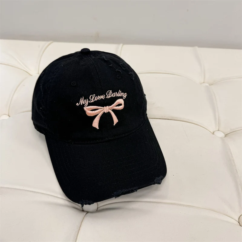 Damen Baseball Cap aus gewaschener Baumwolle mit Schleifenstickerei Skanto