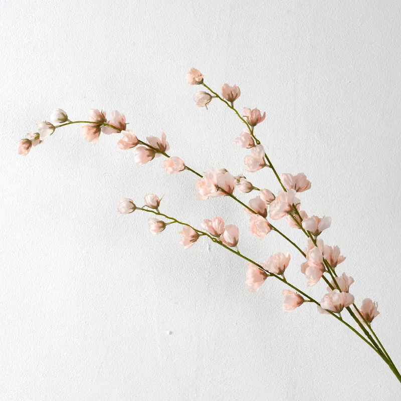 Dekorative florale Erbsenblütenstielanordnung