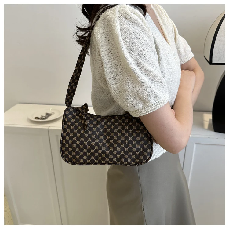 Stylische karierte Schultertasche