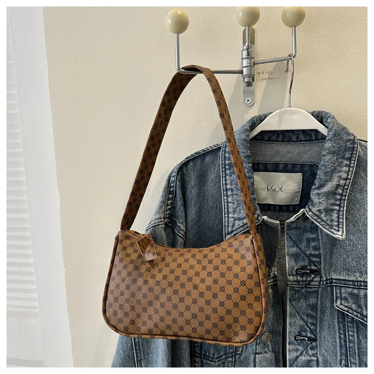 Stylische karierte Schultertasche