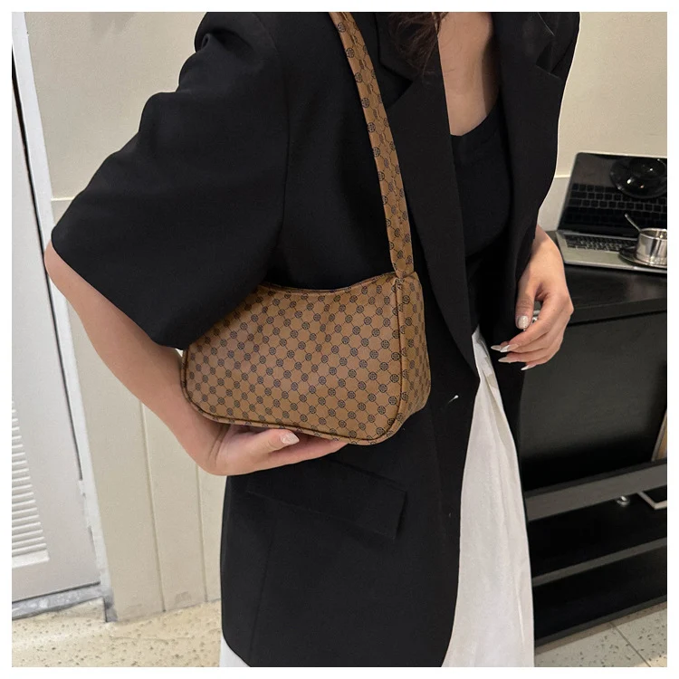 Stylische karierte Schultertasche
