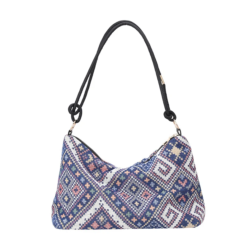 Gepunktete Schultertasche