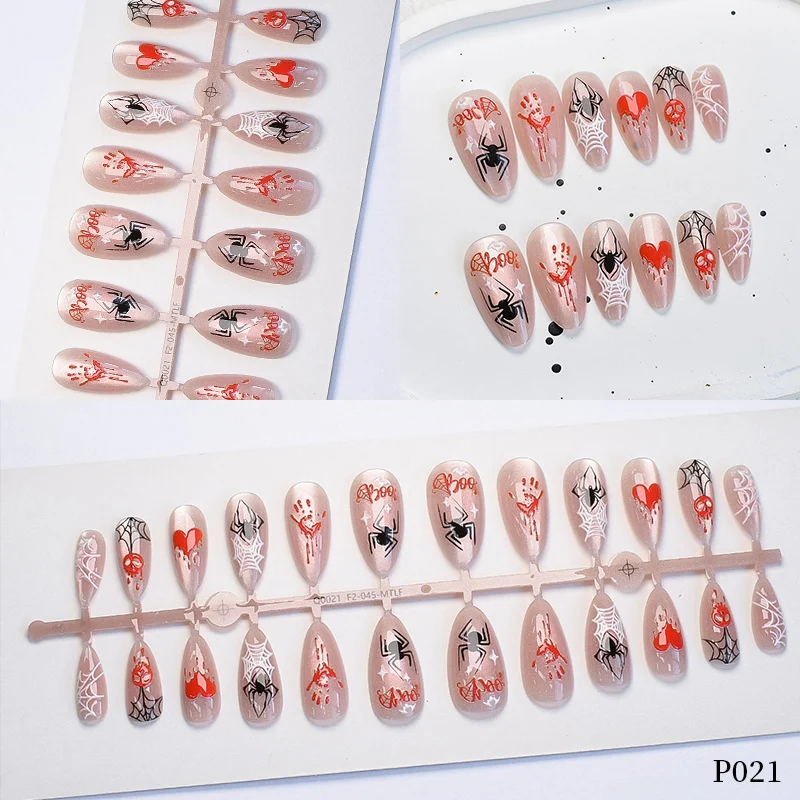 Künstlerisches Press-On Nagelset mit Spinnen- und Webdesigns