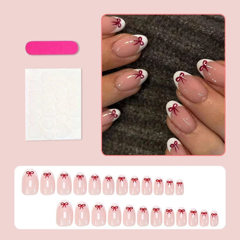 Kunstnagelset mit romantischen Schleifen-Motiven und französischem Design Brehn