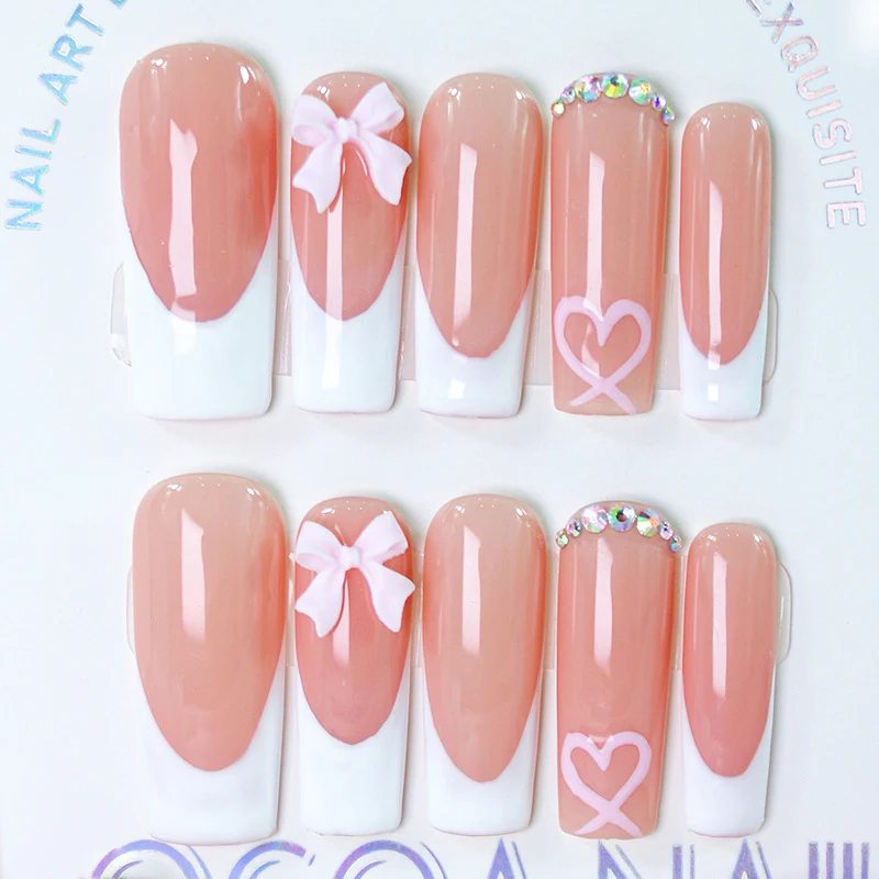 Kunstnagelset mit verspielten Schleifen- und Herzdesigns Brehn