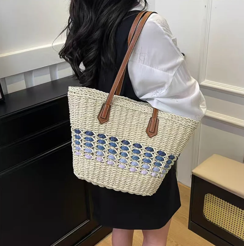 Geflochtene Handtasche mit elegantem Lederbesatz Skanto