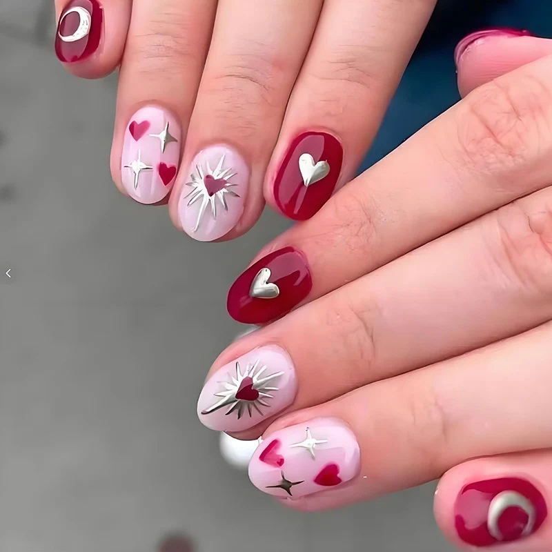 Kunstnagelset mit romantischen Herz- und Sternenmotiven Brehn