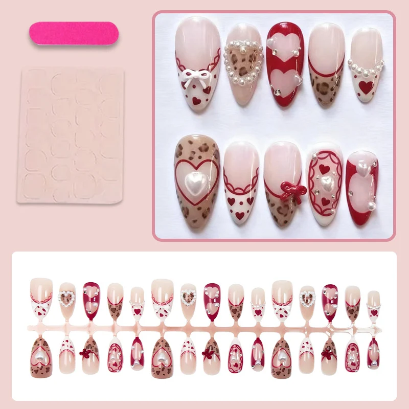 Kunstnagelset mit romantischen Herz- und Schleifenverzierungen Brehn