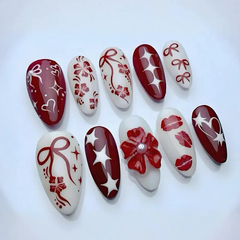 Kunstnagelset mit romantischen Herz- und Blütenmotiven Brehn
