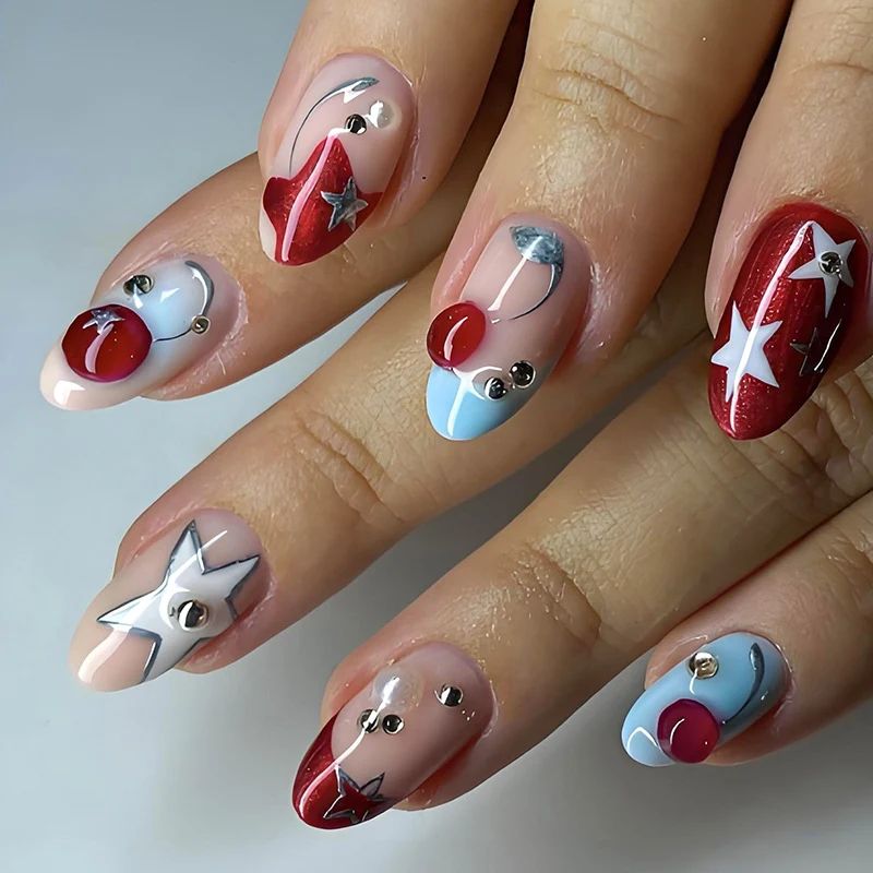 Kunstnagelset mit stilvollen Stern- und Fruchtmotiven Brehn