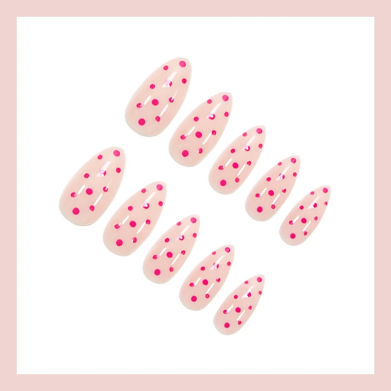 Kunstnagelset mit verspielten Punkten und elegantem Design Brehn