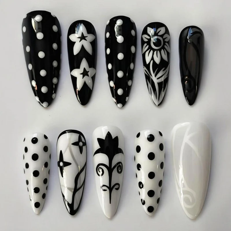 Kunstnagelset mit stilvollen grafischen Mustern Brehn