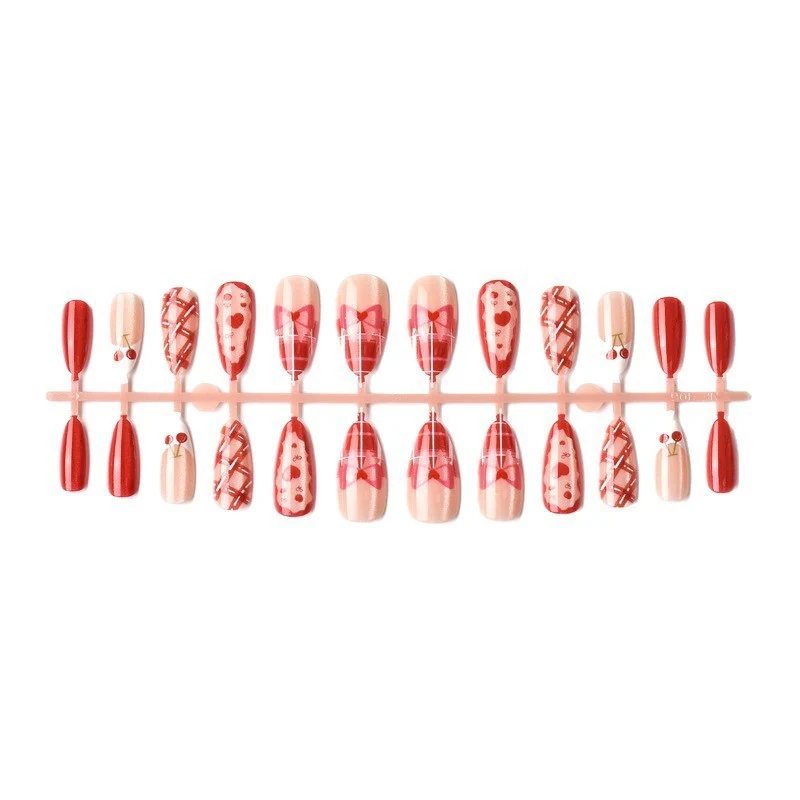 Kunstnagelset mit verspielten Herz- und Kirschmotiven Brehn