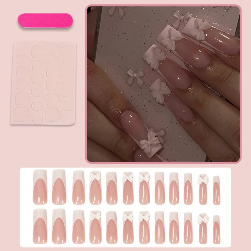 Kunstnagelset mit schimmernden Details und niedlichen Schleifen Brehn