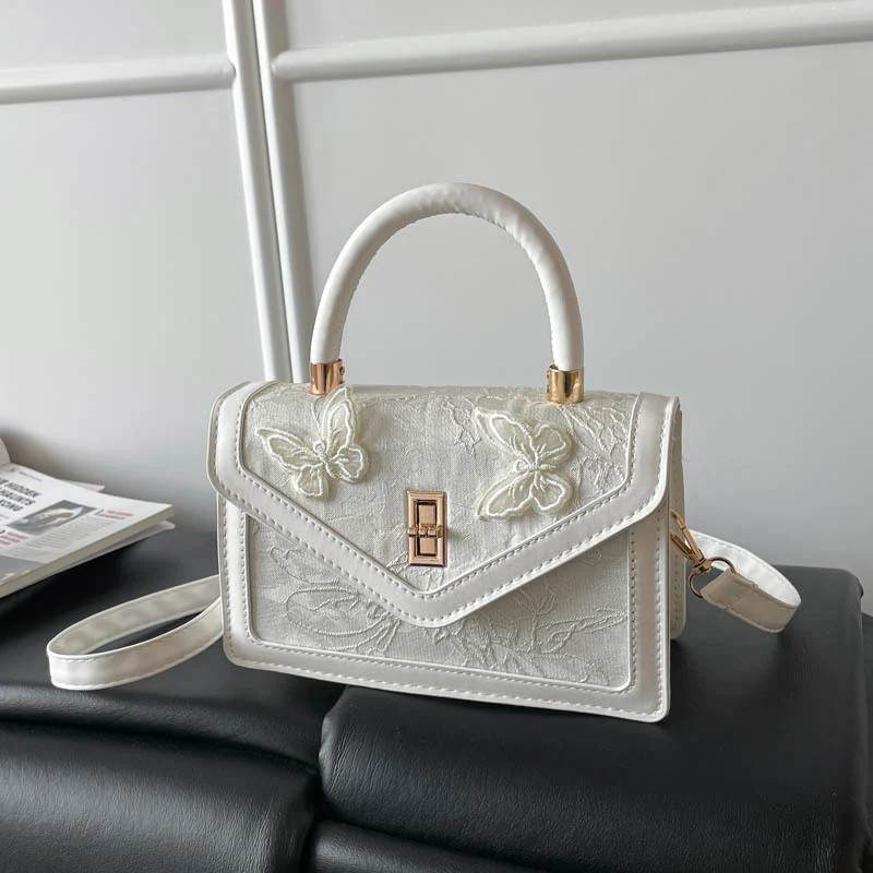Elegante bestickte Handtasche