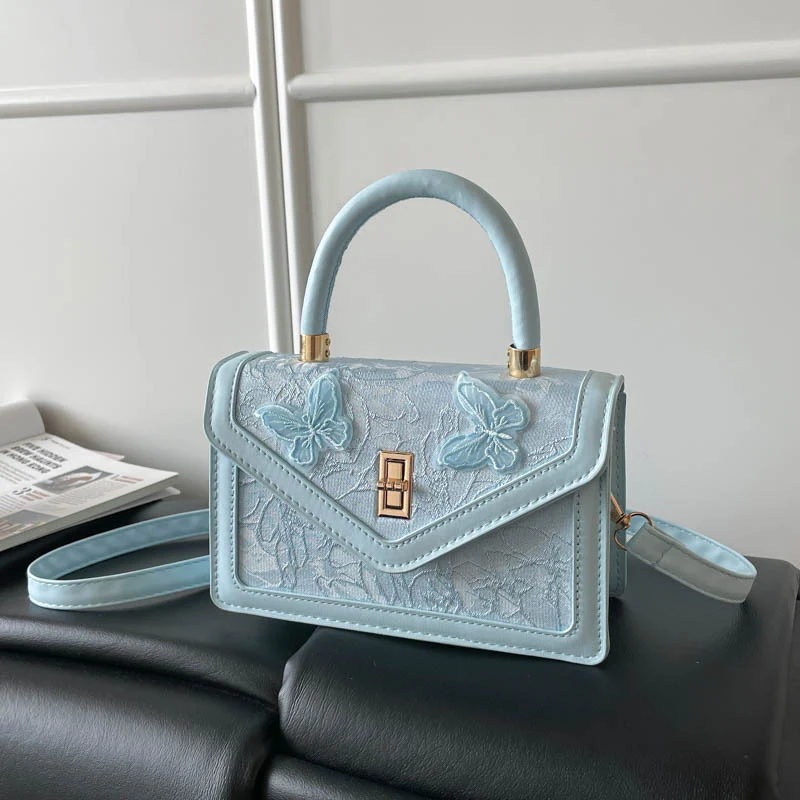 Elegante bestickte Handtasche