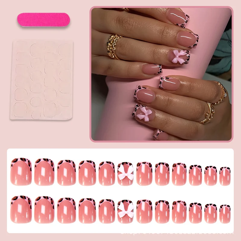 Kunstnagelset mit verspieltem Schleifen-Design und lebendigem Tierakzent Brehn