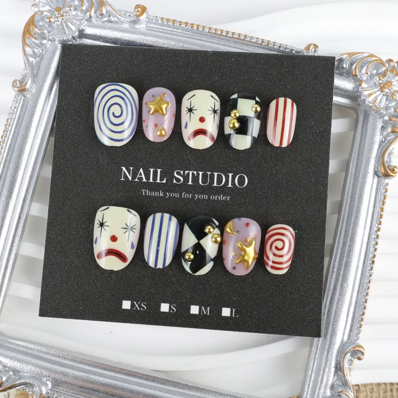 Kunstnagelset mit kreativen Clown- und Sternmotiven Brehn