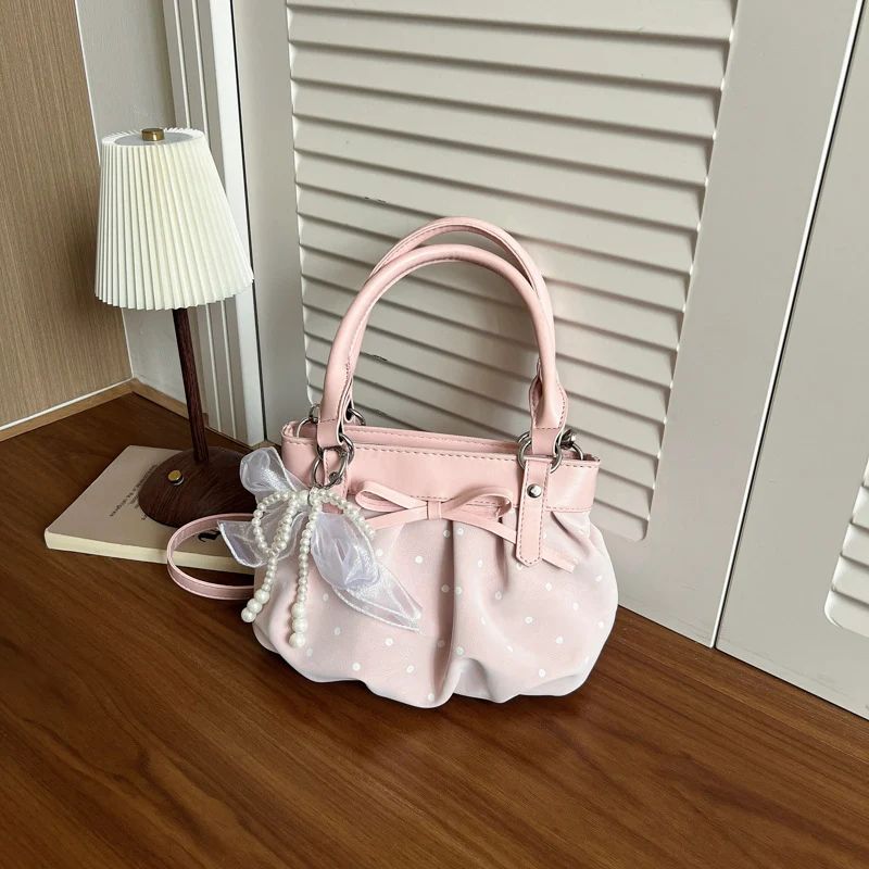 Stylische Pünktchen-Handtasche