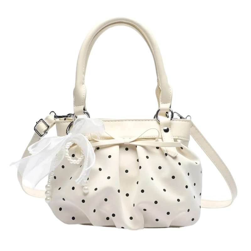 Stylische Pünktchen-Handtasche