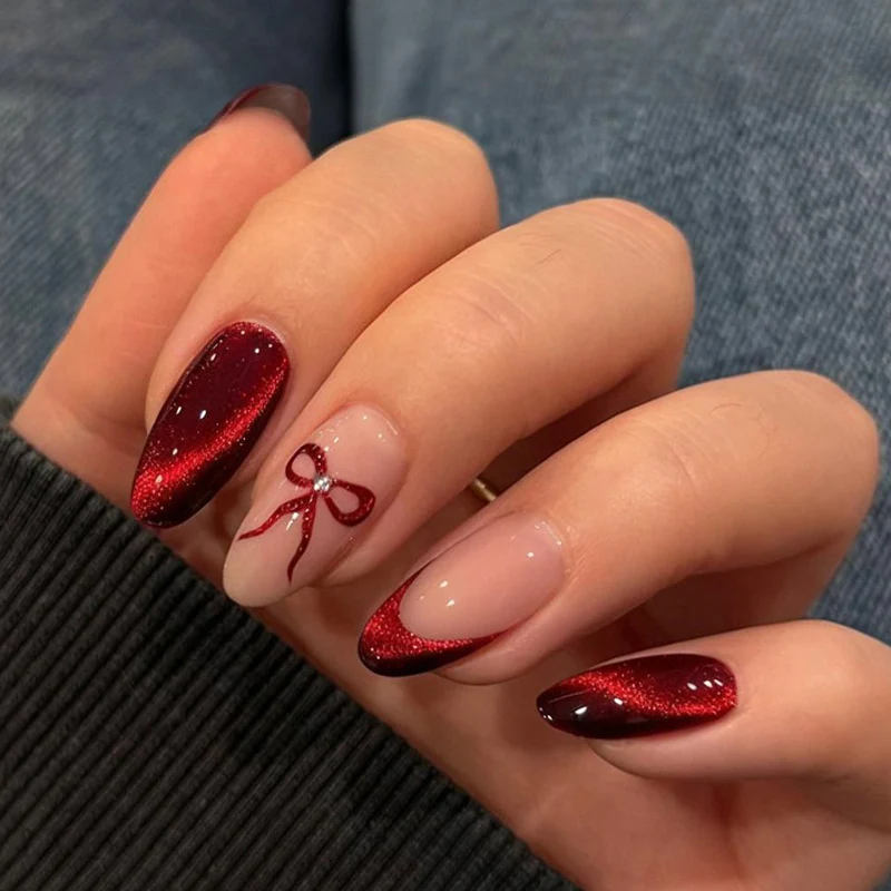Kunstnagelset mit luxuriösen Ombre-Effekten und filigranen Schleifen Brehn