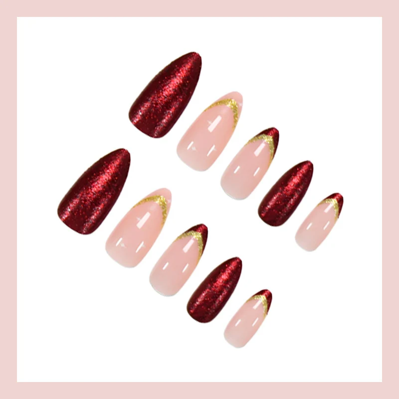 Kunstnagelset mit luxuriösen Glitzerverzierungen und starren Spitzen Brehn
