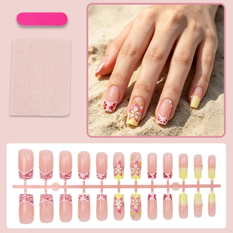 Kunstnagelset mit floralen Akzenten und Glitzerverzierungen Brehn