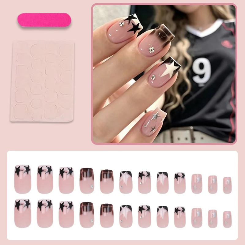 Kunstnagelset mit glamourösen Sternen- und Glitzerakzenten Brehn