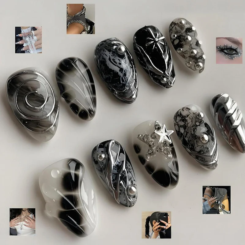 Kunstnagelset mit künstlerischen Mustern und Glitzerakzenten Brehn