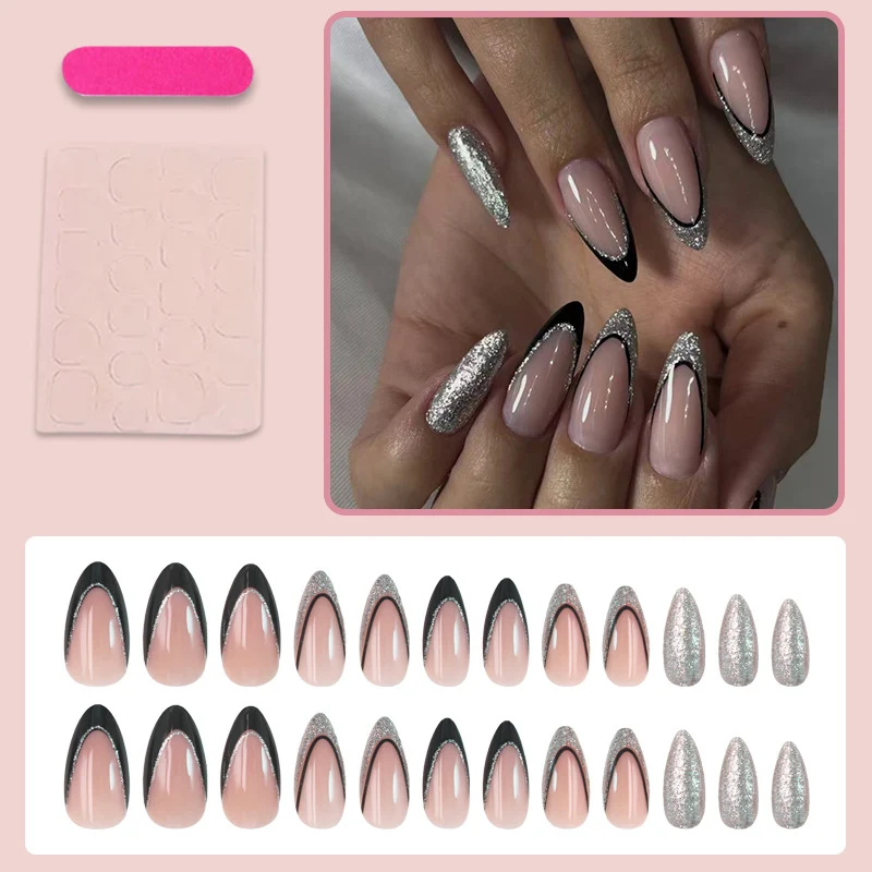 Kunstnagelset mit glamourösen Glitzerakzenten und elegantem Schwarz Brehn