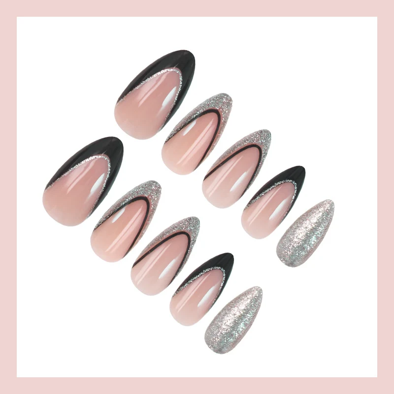 Kunstnagelset mit glamourösen Glitzerakzenten und elegantem Schwarz Brehn