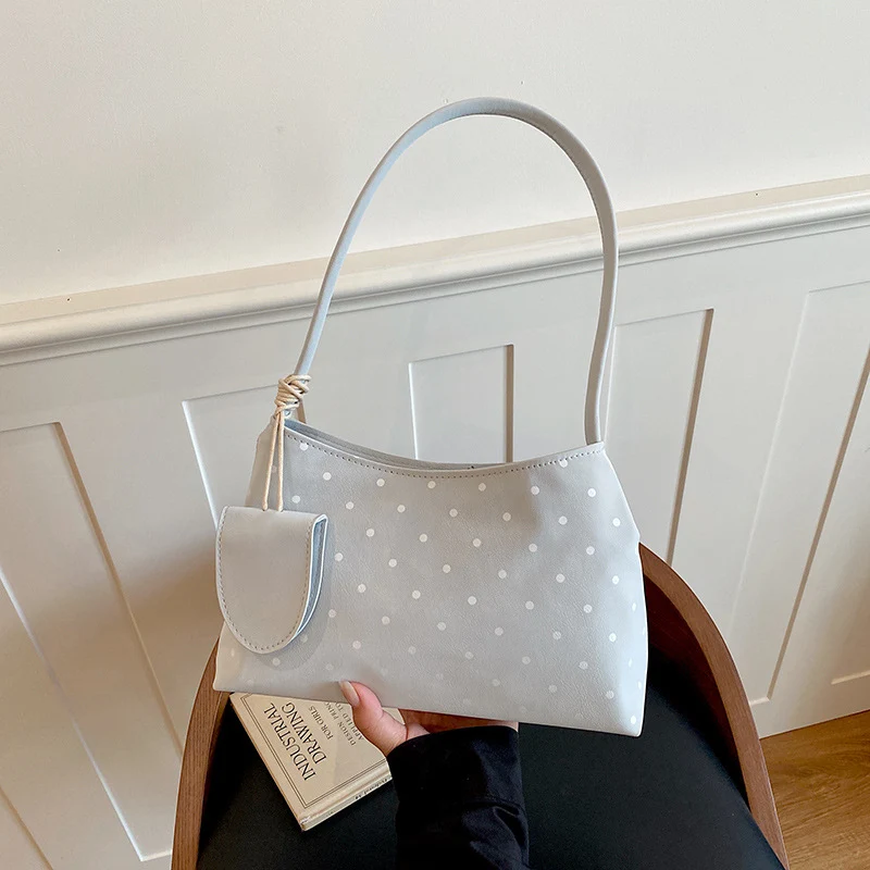 Chice gepunktete Handtasche