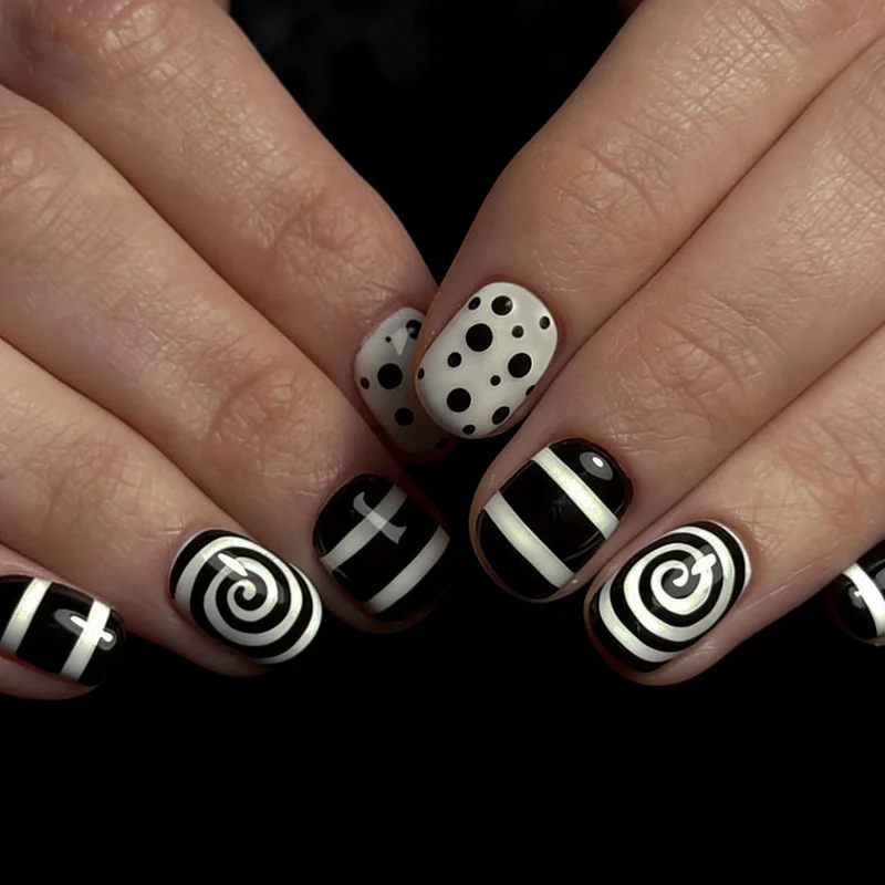 Kunstnagelset mit kreativen Schwarz-Weiß-Designs Brehn