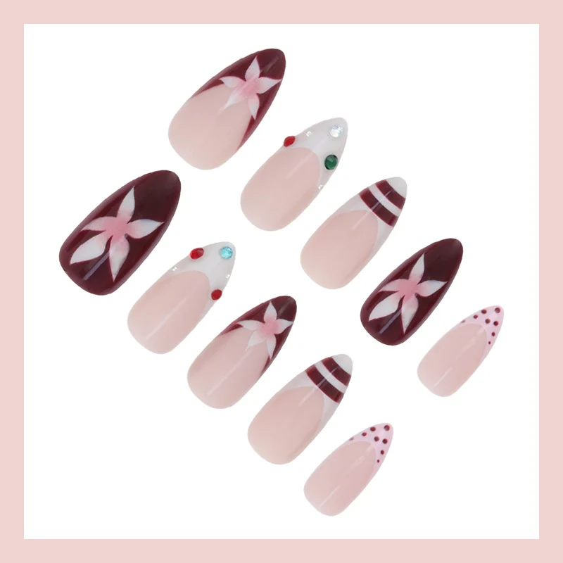 Kunstnagelset mit floralem Design und Glitzerakzenten Brehn