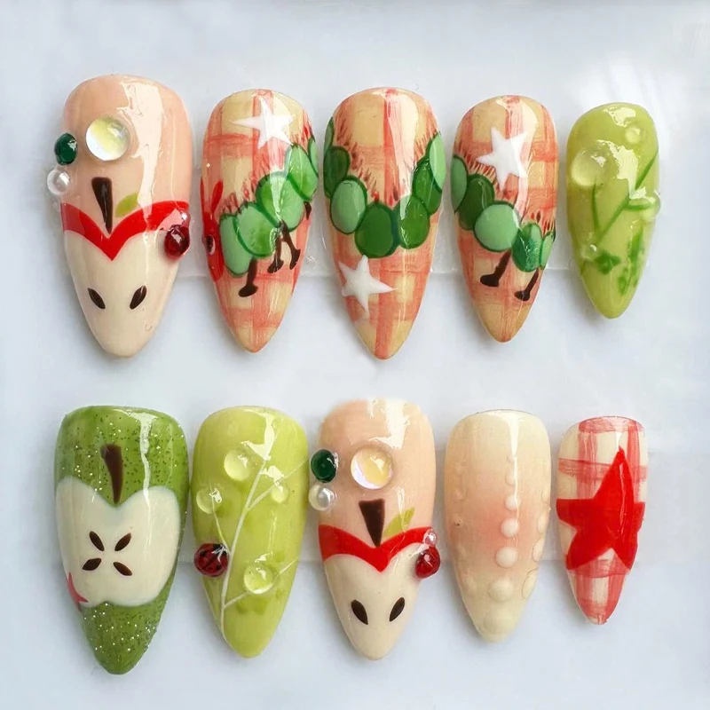 Kunstnagelset mit fröhlichen Obstmotiven und kreativen Details Brehn