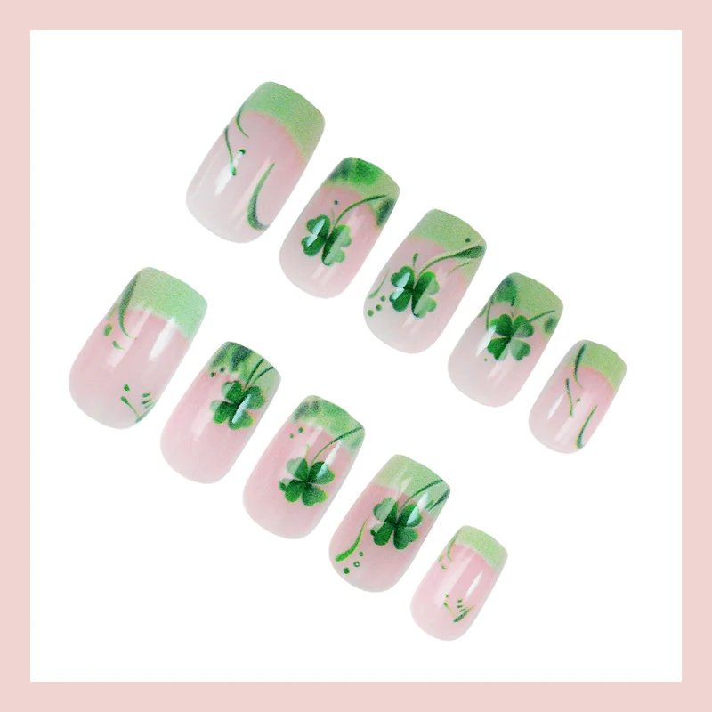 Kunstnagelset mit festlichen Glitzer- und Kleeblatt-Motiven Brehn