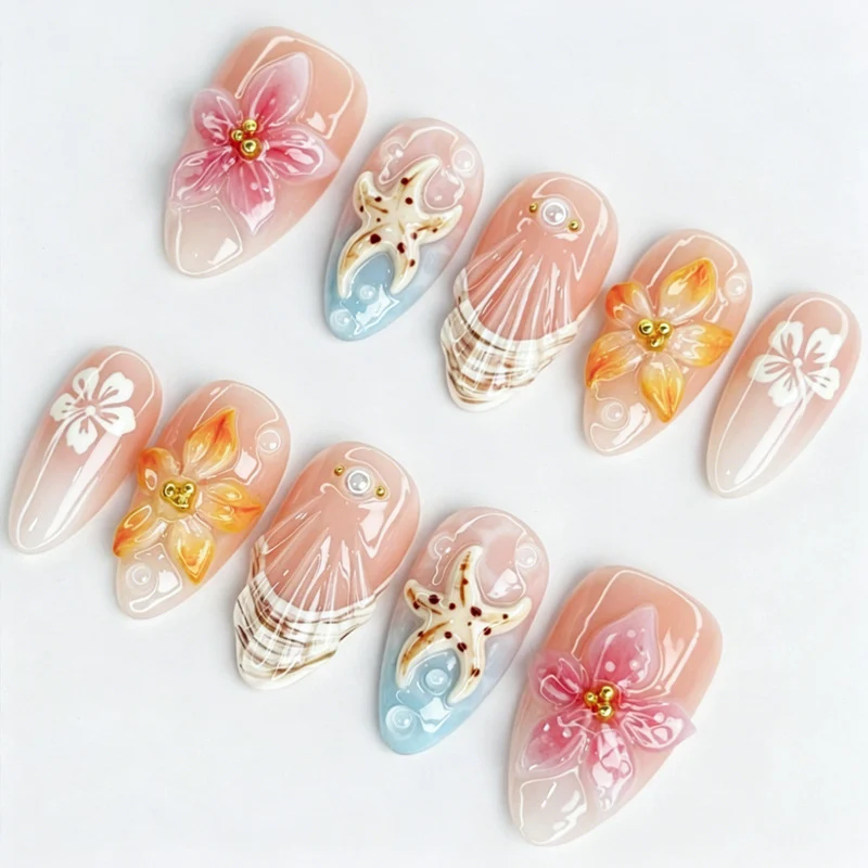 Kunstnagelset mit floralen Motiven und strahlenden Akzenten Brehn