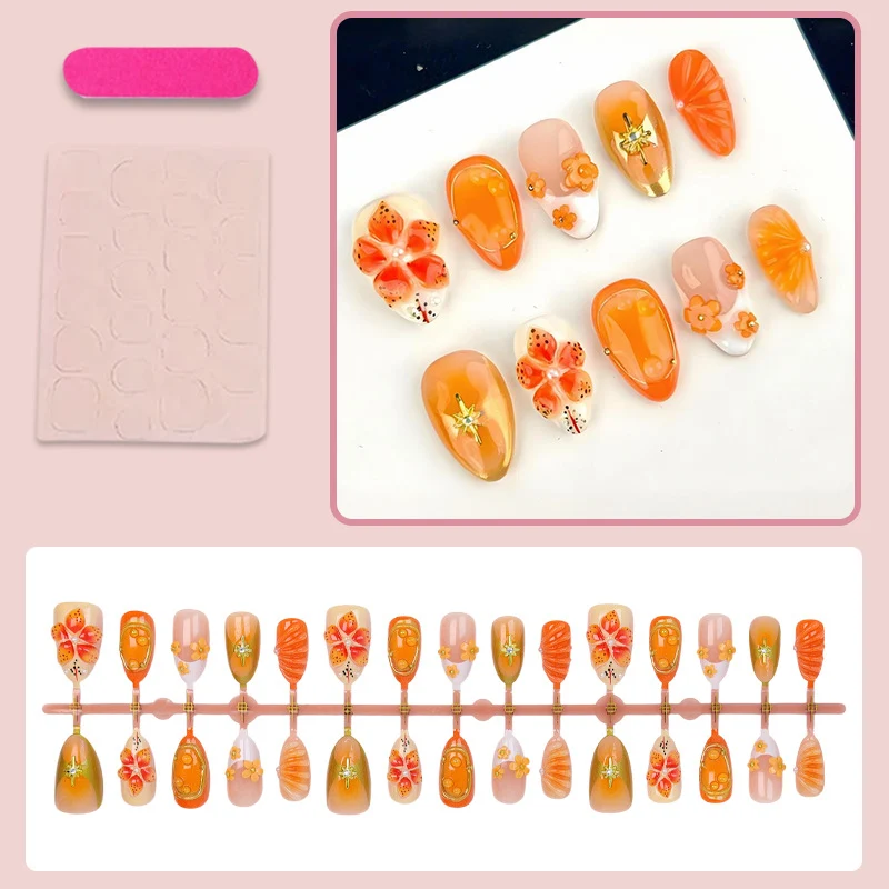 Kunstnagelset mit fröhlichen Blüten- und Glitzerdetails Brehn