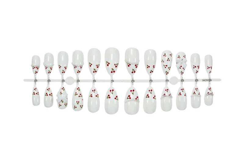 Kunstnagelset mit floralen Cherrymotiven und eleganten Schleifen Brehn
